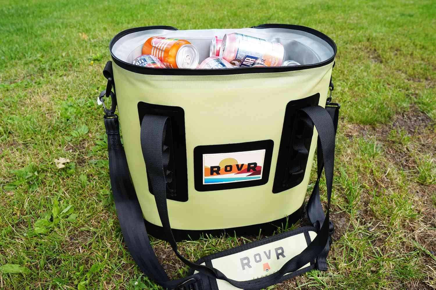 portable cooler with colorful beverage cans, ideal for car trips and outdoor adventures.
