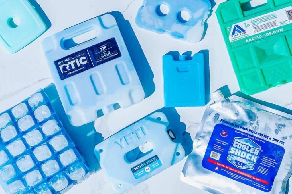 Blue car ice cooler accessories for vehicle cooling and storage, multiple ice packs and containers for car use, KelyLands Car Accessory.