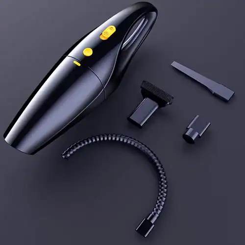 A sleek black portable car vacuum cleaner with multiple accessories including a crevice tool, brush nozzle, and flexible hose, displayed on a dark background.
